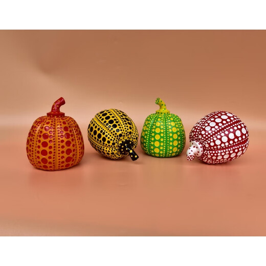 Yayoi Kusama pumpkin ornament sculpture with dense polka dots, yellow background and black dots 10x12 without label