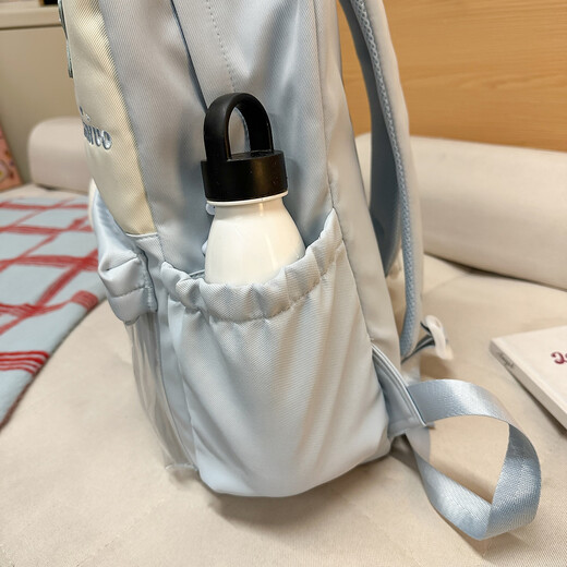 Xinmu school bag for junior high school students, large-capacity backpack for class and travel, college ins versatile primary school student backpack, blue, three random badges + 1 card (star pendant)