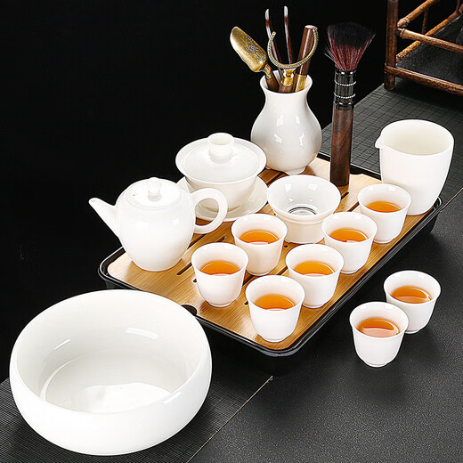 Jingdezhen mutton-fat jade white porcelain Kung Fu tea set for home living room simple modern office Dehua white porcelain tea cup 14-head mutton-fat jade Xishi teapot set (cup with words