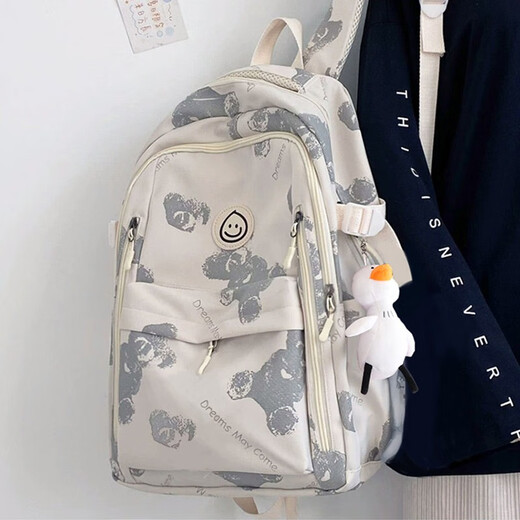 Doublestar schoolbag junior high school female backpack male high school college student backpack new large capacity campus simple sports water repellent black and white print (with big white duck pendant)