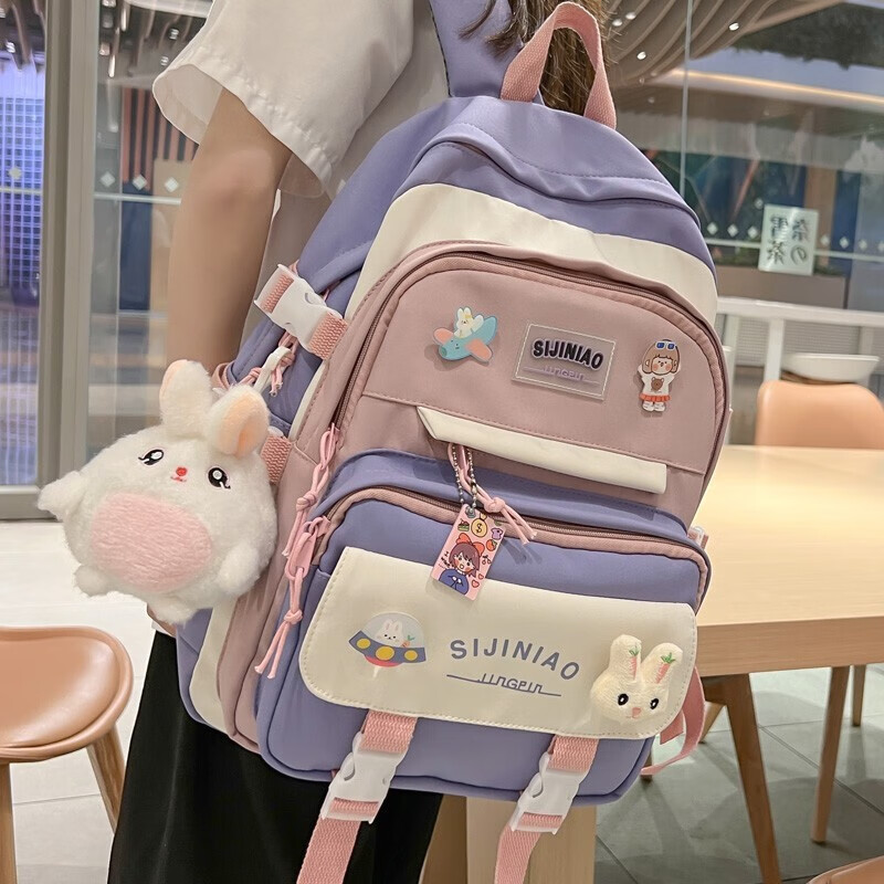 Double Star schoolbag primary school girls' schoolbags for grades 1, 2, 3 to 6, large-capacity sports burden-reducing backpack, large blue size with round rabbit pendant