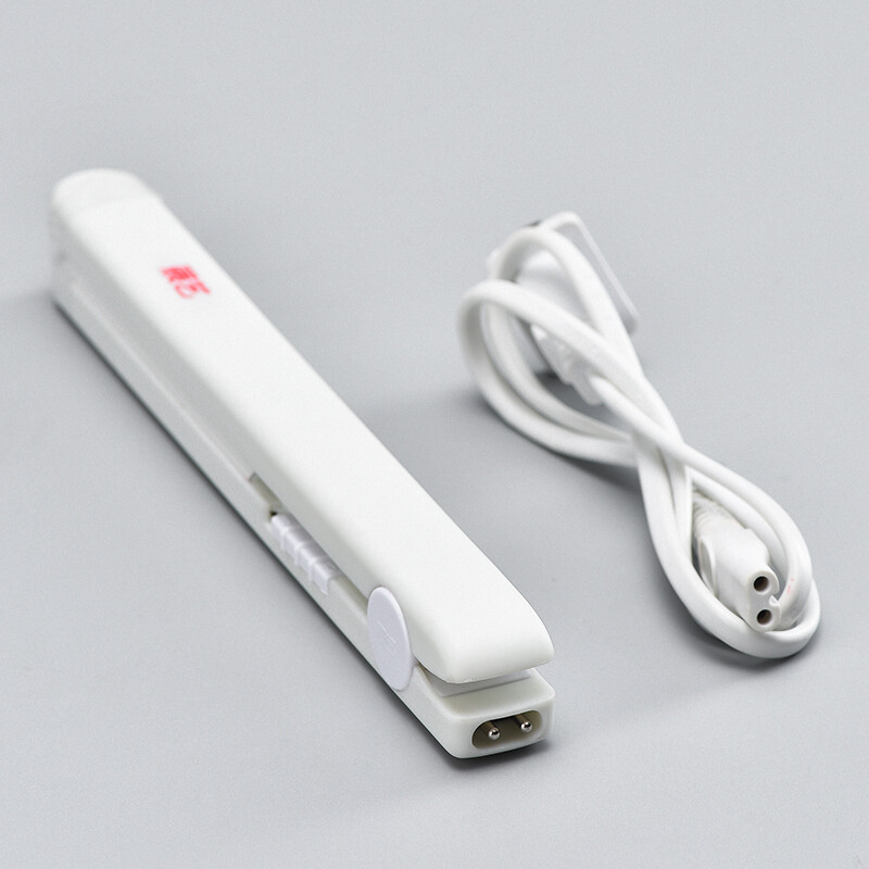 Zhanyi plug-in sealing machine household hand-pressed small portable snack nougat snowflake pastry mini plastic sealing machine Zhanyi sealing machine