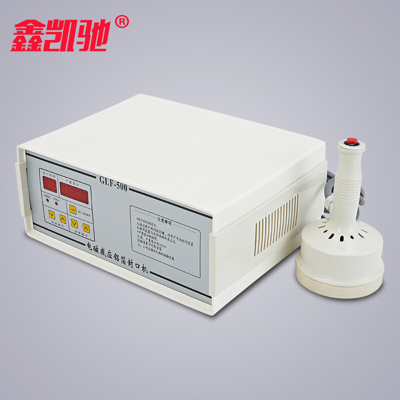 XINKAICHI electromagnetic induction sealing machine aluminum foil medicine bottle plastic capping machine honey plastic bottle cap glass bottle capping machine GLF-500 electromagnetic induction sealing machine