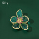 Sili European and American crystal flower brooch women's new exquisite corsage coat pin accessories gold green crystal flower