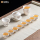 Gold inlaid jade Kung Fu tea set, complete set of home mutton fat jade porcelain drinking tea, tea gift box, high-end ink mountains and seas