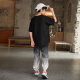 McTicco Boys Summer Fashion Brand Traje deportivo Niños 2025 Nuevos pantalones de manga corta en verano Los niños de tamaño mediano de moda guapo y de moda 9767 Negro + 5725 Color de gradiente [Seda de hielo] 160 cm
