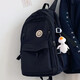 Doublestar schoolbag junior high school female backpack male high school college student backpack new large capacity campus simple sports water repellent black and white print (with big white duck pendant)