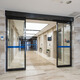 酒店办公楼写字楼自动感应平移门 商铺不锈钢框钢化玻璃感应门厂 茶色
