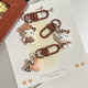 
Leopard print cartoon KT keychain brown autumn and winter retro cat school bag pendant ins style sweet cool hanging decoration cute glasses standing-light leopard print KT