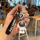 Feihui Internet celebrity creative astronaut keychain, male and female couples' school bag pendant birthday gift, orange astronaut