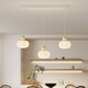 Zhuansi Restaurant Chandelier minimaliste Long Strip Designer 5-HEAD CRAME Style Dining Table Lampe de salle à manger simple MODER