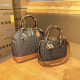 Baizili Light Luxury Brand Genuine Leather Shell Bag 2025 NUEVA Fashion One-Ho-Ho-Ho-Hohor Crossbody Bolsos Versátiles de mujer Versátil Color de caramelo Matitud