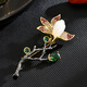 Ancient Hetian jade magnolia brooch, high-end ladies corsage design, niche brand luxury suit pins and accessories, hotan jade magnolia brooch