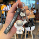 Feihui Internet celebrity creative astronaut keychain, male and female couples' school bag pendant birthday gift, orange astronaut