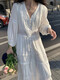 Huayuzhi white dress women's summer 2025 new high-end beach long skirt temperament small person pure long sleeves white long sleeve V-neck design hollow first love skirt M [Suggested 108-130Jin [Jin equals 0.5 kg]]
