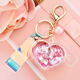 
School bag hanging chain for women creative acrylic into oil bottle quicksand love keychain glitter pink peach heart women Korean cute jewelry pink + fantasy beads + short fantasy color rope quicksand love heart