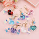 
School bag hanging chain for women creative acrylic into oil bottle quicksand love keychain glitter pink peach heart women Korean cute jewelry pink + fantasy beads + short fantasy color rope quicksand love heart