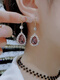 Xiandie Super Flash Purple Crystal Water Drop Boucles pour les femmes 2024 Nouvelles et haut de gamme de papillons d'oreille et de boucles d'oreilles de luxe