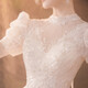 Robe de mariée de maquillage rouge 2025 Nouvelle mariée Princesse Puff Sleeve luxueuse Palace Style Tail Français Robe de mariée principale Light Champagne Slat S