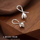 Qi Xiaomi 999 pure silver flower earrings for girls, pierced earrings 2025 new light luxury niche high-end ear jewelry 999 silver magnolia flower earrings price of two