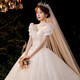 Robe de mariée de maquillage rouge 2025 Nouvelle mariée Princesse Puff Sleeve luxueuse Palace Style Tail Français Robe de mariée principale Light Champagne Slat S
