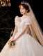 Robe de mariée de maquillage rouge 2025 Nouvelle mariée Princesse Puff Sleeve luxueuse Palace Style Tail Français Robe de mariée principale Light Champagne Slat S