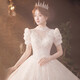 Robe de mariée de maquillage rouge 2025 Nouvelle mariée Princesse Puff Sleeve luxueuse Palace Style Tail Français Robe de mariée principale Light Champagne Slat S