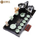 Gold inlaid jade Kung Fu tea set with solid wood tea tray for home office fully automatic water boiling electric tea stove elegant stone ladle