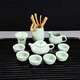 Gold inlaid jade Kung Fu tea set with solid wood tea tray for home office fully automatic water boiling electric tea stove elegant stone ladle