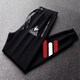 Le coq sportif French big cock casual sports pants for men in spring, autumn and winter new fashion versatile running leggings long pants black plus velvet leggings red and white three stripes 3XL recommended 180-200Jin Jin equals 0.5 kg