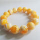 Holy glass natural amber beeswax bracelet Russian material white flower ore bracelet necklace round bead pendant for men and women chicken oil yellow bracelet 12mm white honey amber 16 pieces in a bunch