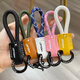 Laazee en cuir exquis porte-clés tressé à la main de la corde en cuir à la main PENDANT POUR LE COURCE COURCE MENCE MENCE MODE CLÉ COMPORT DÉCORATION DE COURT