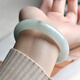 A thousand-year-old jade jade bracelet women's ice-bottom light green carved jade bracelet jade jade with certificate [Two models about 56 mm] QZC6169