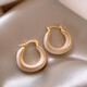 Pendientes de esmalte de goteo para mujeres Light Luxury Nicho Diseño Sense Pendientes de auriculares de alta gama 2025 Pendientes de temperamento nuevo de moda Pendientes de glaseado de goteo blanco E3271