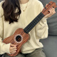 
hluru children's guitar beginners can play zero-basis children's ukulele plucking piece for boys and girls music toys [cartoon model 42cm] Little yellow tiger