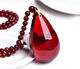 MUSI natural water purified blood amber drop pendant sweater chain Myanmar raw mineral beeswax amber Wushi brand men and women necklace pendant blood amber drop + blood amber chain