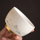 Gold inlaid jade mutton fat jade porcelain household ceramic tea cup master cup tea bowl kung fu tea set gift box Yunshan master cup