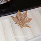 QUAMER gold store maple leaf sweater brooch design niche 2024 new high-end brooch female style light temperament electroplating-gold