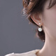 Qi Xiaomi camellia earrings for women 2025 new niche high-end imitation pearl earrings light luxury earrings temperament tassel earrings a pair of camellia earrings
