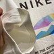 耐克（NIKE）短袖男装2025夏季新款跑步运动服针织透气时尚宽松圆领上衣T恤衫 HF6172-133米白纯棉 M