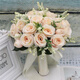 Bride with flowers in hand gets married. Wedding simulated flower ball wedding bouquet. Fake flower bridesmaid photo props bouquet. White + purple tea plum