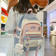 Pull back large-capacity schoolbag female junior high school student college student backpack high school student niche primary school student third to sixth grade backpack
