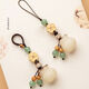Beiyipin mobile phone lanyard mobile phone chain hanging decoration [financial source] natural bodhi fruit hand-carved money bag mobile phone lanyard creative Chinese style key pendant lucky bag hanging decoration wealth chain