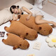 Shangyun Chinese Valentinstag Geschenk Nezha Puppe Plüsch Spielzeugmädchen schläft mit ihrer Kissenpuppe Long Strip Kapibala