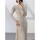 Wutuo dress is a high-end light luxury evening girl 2024 new niche long-sleeved sequin annual meeting host slim and slim apricot silver L