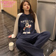 Pyjamas modal printanière et automne pour femmes Nouvelles à manches longues Couc mignon carton de style carton de style caricaturé doux.
