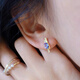 Shilian Beidao Iris high-end light luxury daily versatile commuting sterling silver inlaid natural tanzanite stud earrings