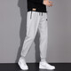 Kappa (Kappa) back-to-back casual pants for men's spring and autumn 2024 new loose large-size sports pants versatile teen casual pants black flat feet 4XL (recommended 175-190Jin [Jin equals 0.5 kg])