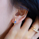 Shilian Beidao Iris high-end light luxury daily versatile commuting sterling silver inlaid natural tanzanite stud earrings