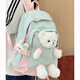 
Curious cat cute little bear schoolbag female junior high school student plush cartoon doll large capacity backpack elementary school student backpack blue pink [with big bear doll + candy rabbit]
